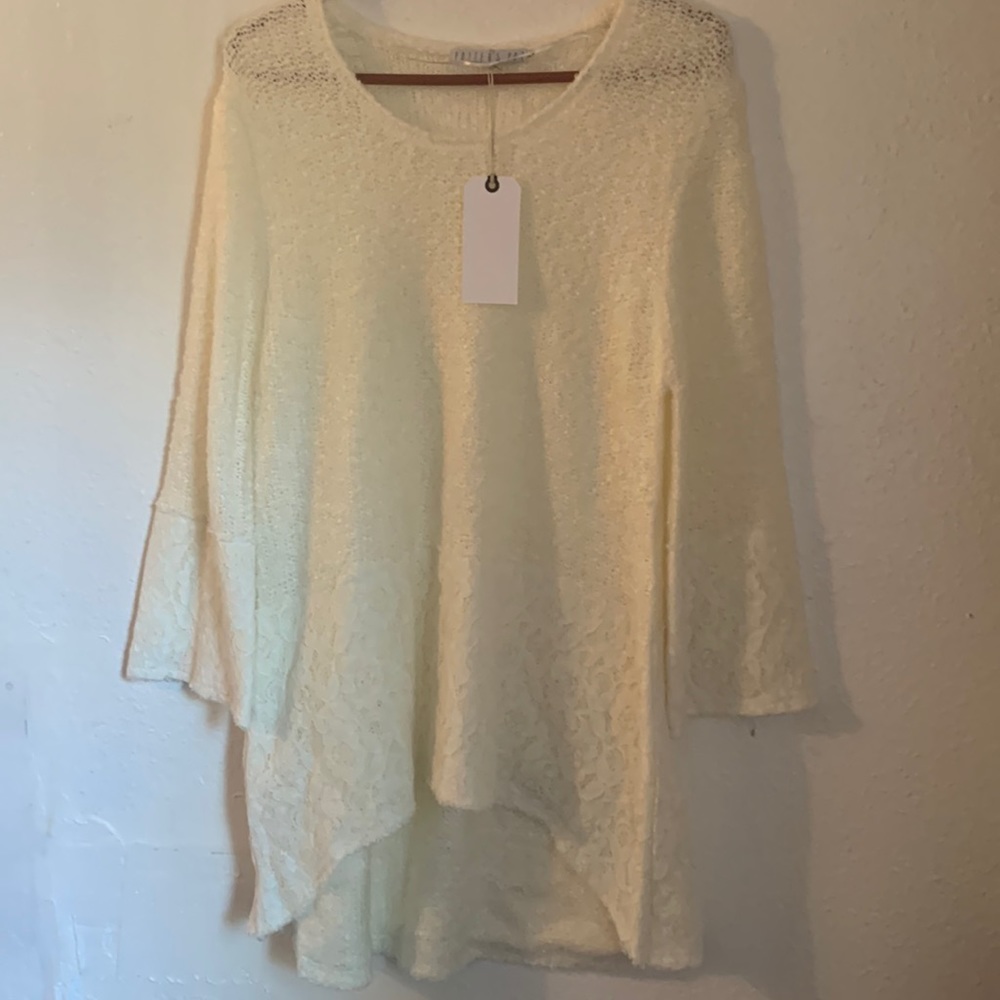 Size large cream colored tunic style dress. New with tags.